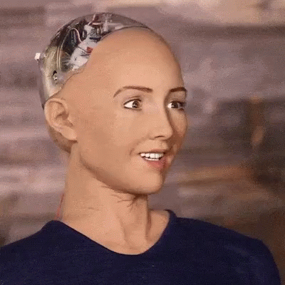 an uncanny female robot making a strange face